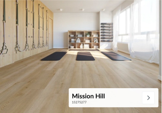 A sunny and spacious yoga room with mission hill color vinyl flooring from the Builddirect's ultimate collection
