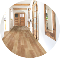a hallway with beatiful wood flooring